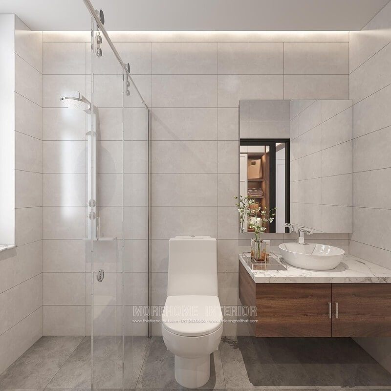 Thiết kế gương phòng tắm thường làm bạn băn khoăn tuy nhiên bạn nên dựa vào đặc điểm phòng tắm của mình để lựa chọn sao cho phù hợp. Với một không gian phòng tắm cần sự đơn giản nhưng sang trọng thì việc sở hữu chiếc gương hình chữ nhật không bo viền phối kết hợp với mọi thứ xung quanh từ tủ gỗ óc chó mặt đá, tường giả gạch bê tông mới là điểm tạo nên vẻ đẹp tổng thể ấn tượng cho toàn không gian.